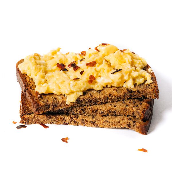 Protein grain and seed bread stacked with eggs image number null