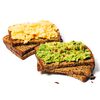 Protein grain and seed bread stacked with eggs and avacados image number null